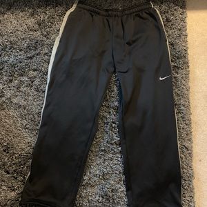 Men’s Black Nike “Therma-Fit” Sweatpants.